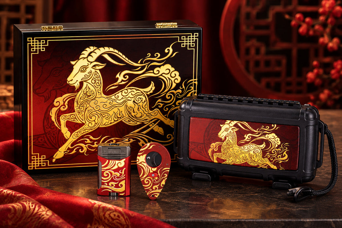 Quality Importers Year of the Goat Collection, four red-and-gold cigar accessories