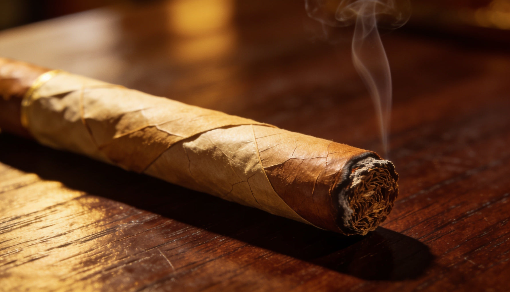 A premium light-wrapper Connecticut cigar resting on a wood table, the best Connecticut cigar to try