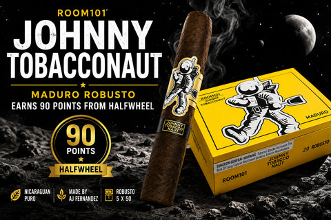 Room101 Johnny Tobacconaut Maduro Robusto cigar and yellow box with a 90-point halfwheel rating badge